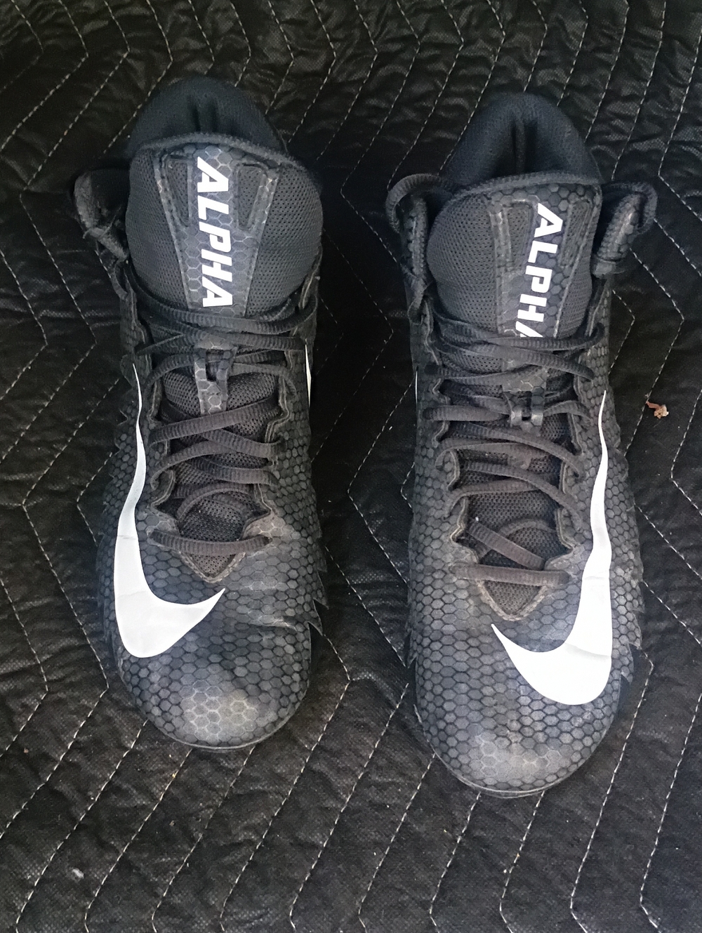 Nike Men’s Black Athletic Cleats with White Swoosh
